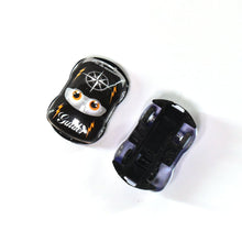 Mini pull back cars arranged for children‰۪s play, featuring various colors.
